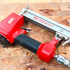 vecteezy_uses-a-professional-stapler-or-nail-gun-on-wooden-table_14840903 vecteezy_uses-a-professional-stapler-or-nail-gun-on-wooden-table_14840903
